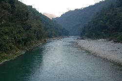 The Seti is one of the warmest rivers in Nepal; even in the middle of December it's not too freezing if you flip in the rapids. There are some level 2 and 3 rapids; but there are also very gentle parts where we slowly paddel through narrow gorges; watch monkeys on sheer walls; and beautiful kingfisher birds on moss-covered stones.