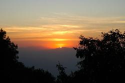 Last rays of the sun before it sets behind the Siwali range.