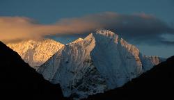 Early light hits the mountains on the way to Shey.