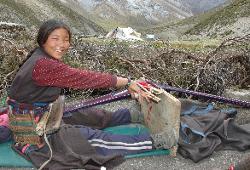 Weaving in Shey, most people move with their cattle in summer time to pastures outside of their village, and live in tents during the time.