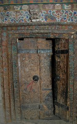 Wooden door to Shipchok's monastery, one of the few Bon monasteries remaining.