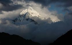 Thamserku in clouds in the late afternoon.