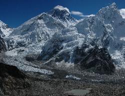 View from Kala Patar; 5'545 m; on the Everest glacier (base camp at the very left); the beginning of the icefall leading to the south col; Everst's summit hidden in ligh fog; Lhotse to the right of the south col and Nuptse at the very right.