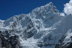 Nuptse is dwarved in size by surrounding summits; but the ice-clad west face is a very impressive sight.