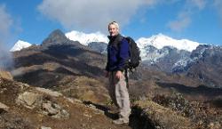 Walking from Dzongri towards Tangshing with Himalayan giants in background