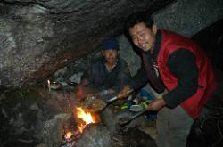 Dawa prepares dinner at the best spot we could find