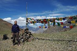 After long and neverending hours and some false passes we finally do reach the real pass; and relax despite the cold wind.