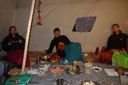 Enjoying snacks before dinner; with a large selection of teas; biscuits; popcorn and sauces. Yes; trekking can be luxurious at times.