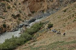 We cross the rickety bridge near the shepherd hut; and climb up to reach our campsite.