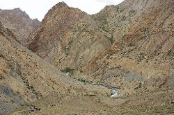 Parfi La is reached by the zigzag trail in the background; I am glad we came down and do not have to go up.