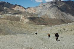 We leave the fertile valley below us and climb the last meters to the first pass; many more will follow in the next two weeks.