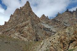 Jagged craggy hills in stunning colours make for an interesting walk.