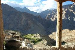 From the veranda of the monastery we look over the village and its fields. In the background on the opposite hillside lies the path to Cho Cho Guru La and Singe La; both passes catching the last rays of the sun.