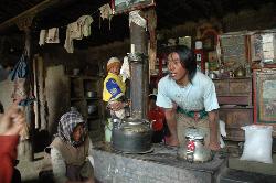 Yak herder and guide in his family's living room.