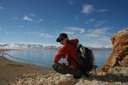 Sonam enjoying the rest and the view from a hill above the Heavenly Lake.