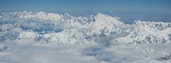 Approaching the Himalayas after half an hour in the air; Cho Oyo; Mount Everest; Lhotse; and Makalu are very close.