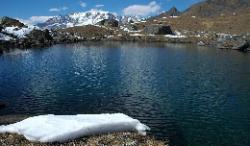 Unnamed pond above Chuna with reflections of Chumuyulmo Kang.