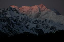 Just before 6.00, the sun hits the southern spur and long ridge of the 8'586 m high peak.