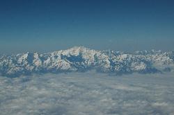 The Himalayas pass by the right window during the flight from Bagdogra to Delhi: all the majestic peaks of the eastern Himalayas: Jannu, Kangchenjunga, Rathong, Kabru, Talung, Kangchenjunga, Pandim, Simvu, Siniolchu. I can't believe all the weeks of carefree walking I have spent here the last few years, and hope many more will follow.
